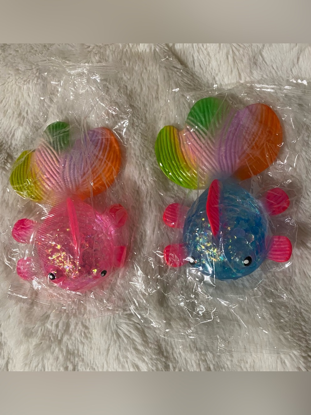 Set of 2 Sugar Textured Rainbow Tail Goldfish Squishies–Pink & Blue Glitter